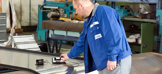 Specialist Inspecting Steel Conveyor Belt with Device